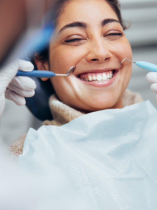 Lady getting her teeth checked