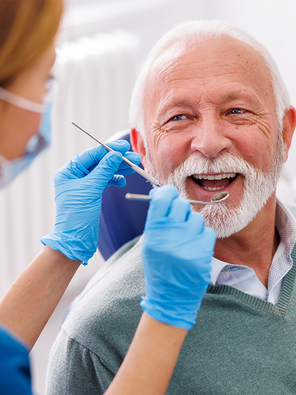 Man getting his teeth checked